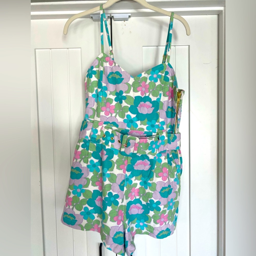 Floral Denim Romper. Size small. NWOT.